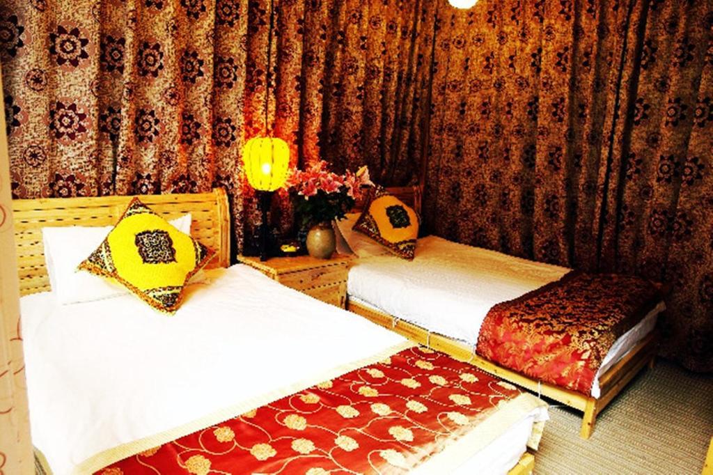 Yunxi Inn Λιγιάνγκ Δωμάτιο φωτογραφία
